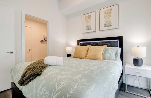Kitchener House | Stylish Downtown Suite with Patio & City Views