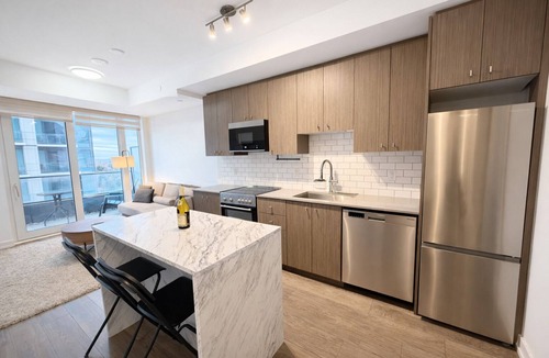 Kitchener Condo | Stylish Oasis Condo | Gym, Bowling, Pool, Hot Tub