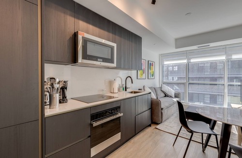 Wellington Place Condo | Stylish Sunlit Condo in Downtown Toronto