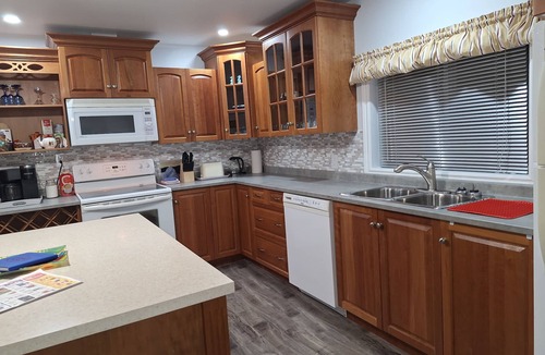 Botwood House | Terrys Place in Botwood, NL. Cozy 2 BR/2 bathrooms/cot/2 bathrooms. Sleeps 6.