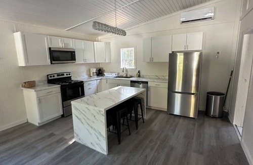 Fluker House | The Pines Retreat - Rustic Modern Camp with WIFI! Pet Friendly!