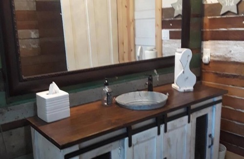 McKinney House | The Rustic Farm House with a Touch of Modern Charm sits on 79 acres.