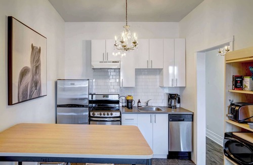 Plateau Mont Royal Apartment | Top-Floor Balcony Overlooking Mont-Royal Ave Cafés