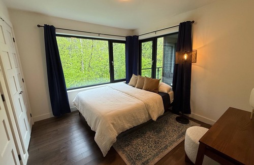 Eastman House | Tranquil and luminous forest retreat with swimming pond and spa!