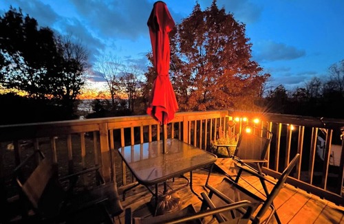 Plympton-Wyoming Cottage | Unique A-frame retreat right on the river and steps to the beach.