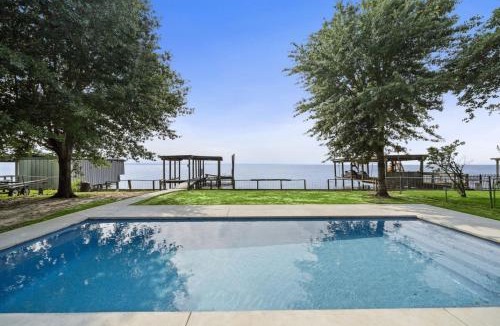 West Livingston House | Unique lakefront home with private pier, stunning views, and a pool