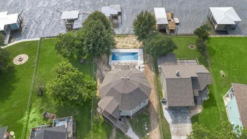 West Livingston House | Unique lakefront home with private pier, stunning views, and a pool