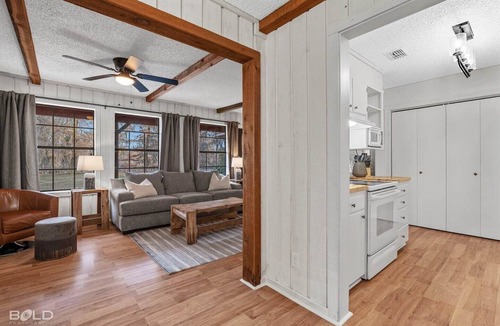 Uncertain Cabin | Unwind in a cozy rustic-modern cabin with a front porch, private dock access, firepit nights, outdoor dining, and cornhole. RV site next to house.