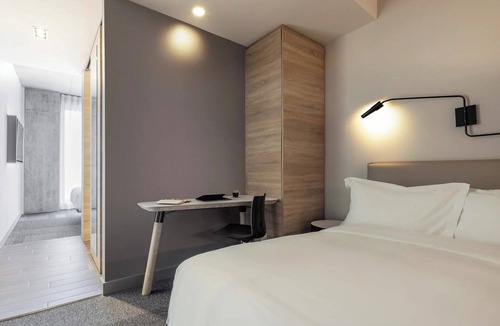 Brossard Hotel | Unwind in Modern Room w/Chic Design + Large Windows in Prime Location | 3 Units