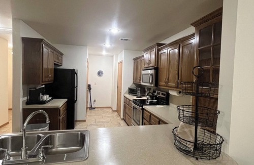 Spiro House | Upscale home with high end furnishings and memory foam king bed. 2 car garage