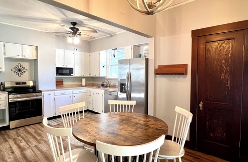 Salina House | Walk downtown, Charming 3 BR -2 King beds, Porch, Fire Pit, Theatre, Fenced Yard