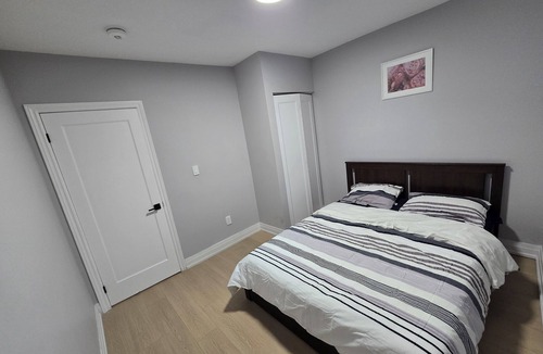 Niagara Falls Apartment | Walk to the Falls! 2BR Modern Home Base + Free Parking & Laundry