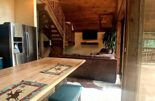 Plantersville Cabin | Waterfront Cabin Retreat with Private Dock and Pool in Plantersville Texas