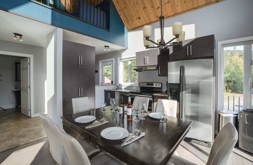 Saint-Raymond Cabin | Waterfront Chalet w/Hot Tub, Lake Access & Paddleboards