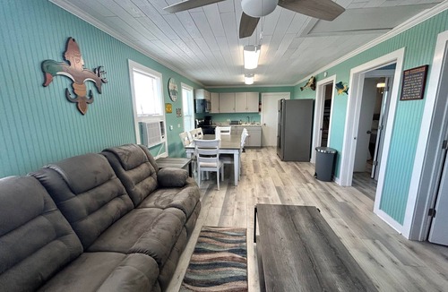 Golden Meadow House | Waterfront Fun -Coastal Realty Group Near Elmers Island