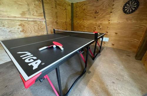 Shoreline Park House | Waterfront Home Game Room Ping Pong Outdoor Bar Area