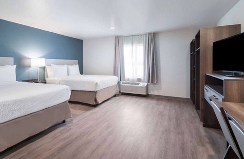 Plano Hotel | WoodSpring Suites Dallas Plano Central Legacy Drive