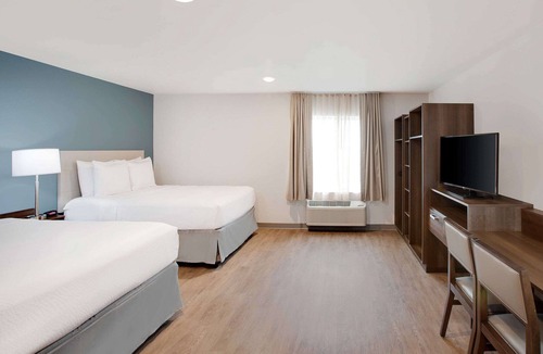 Dallas Hotel | WoodSpring Suites Plano - North Dallas