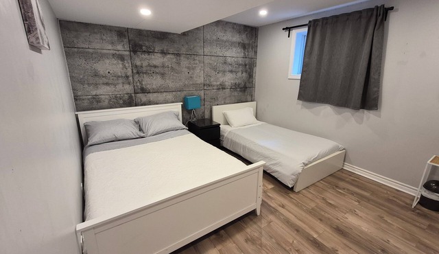 1-bdrm basement unit (full bathroom/shared laundry)