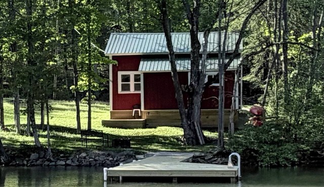 2-bedroom lakefront cottage on Rushford Lake with private dock.