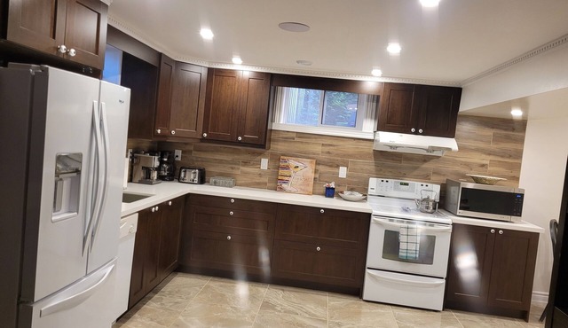 Beautifully Finished Apartment with Heated Floors and Pool Table