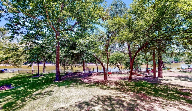 Brazos Riverfront Home on Large Waterfront Lot with Private Hot Tub & Canoe