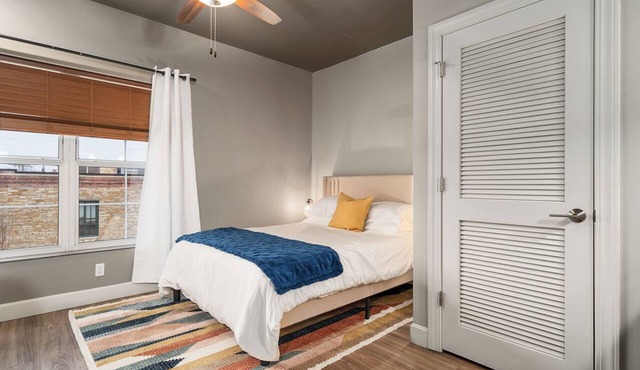 Downtown Lawrence Condo 1 Block to Mass St Walk to KU Hot Tub Sleeps 4