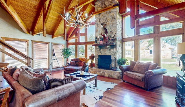 Lake view home with expansive yard, lovely porch & nearby lake access