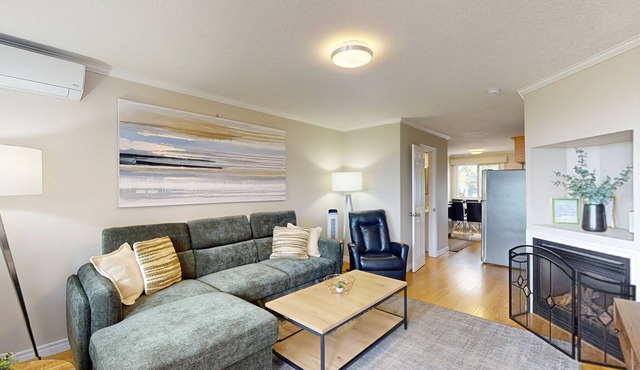 Lakefront condo steps to the beach with pool, and fireplace