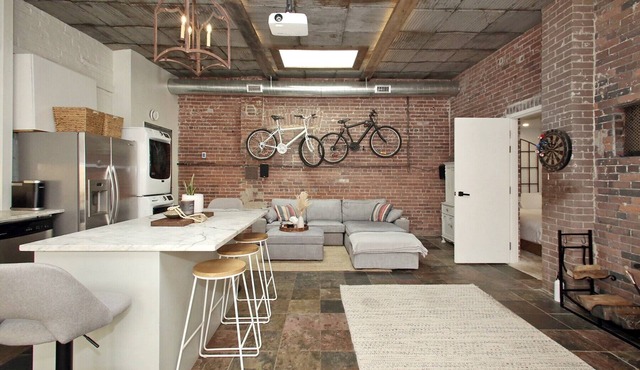 Leslieville LOFT with Wood Burning Fireplace and Skylights! Parking Included.