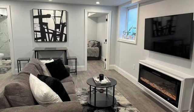 Modern, clean, bright two bedroom lower level look out duplex with large windows
