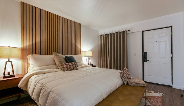 Modern King Room with Plush Bedding – Perfect for Business or Leisure Stays!