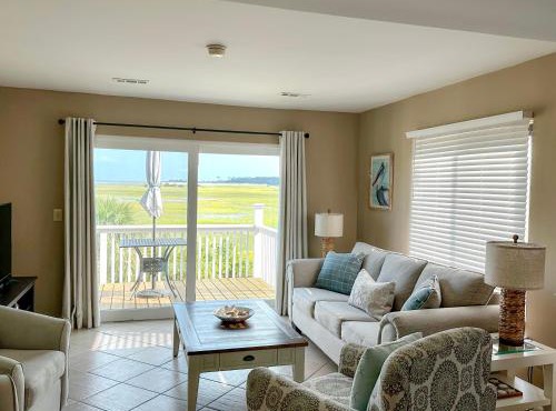 Panoramic Marsh and Ocean Views. Steps to Beach and Pool.