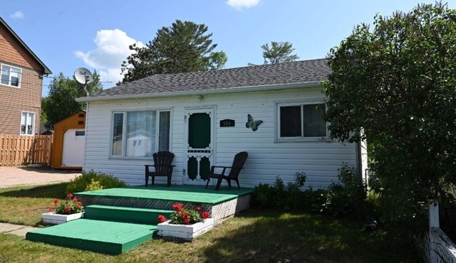 Property located close to the beach, park, grocery store and restaurants. n