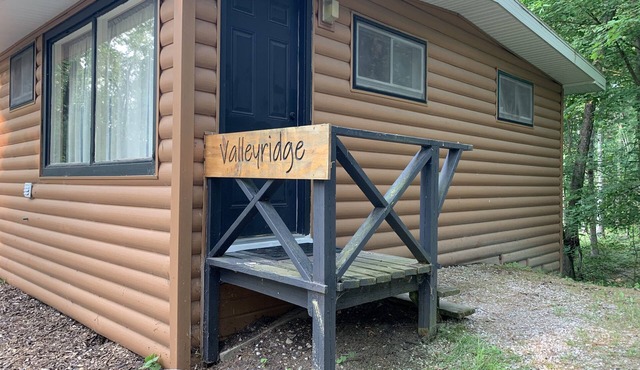 Rustic cabins in secluded campground with lake access and woods to wander in.