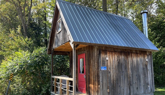 Rustic forest hut (taxiway station)