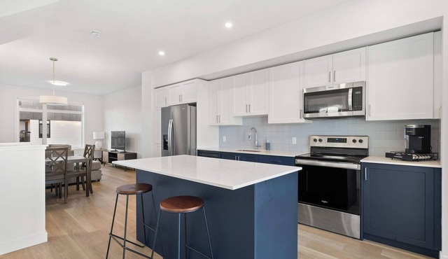 Skyline Retreat | Spacious 4BR Home with Balcony!