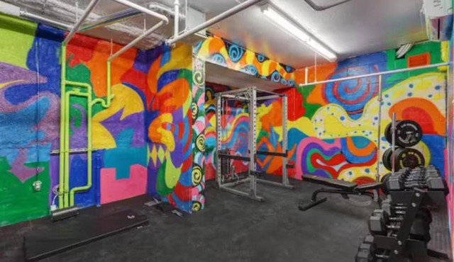 Sleek Modern 2BR Getaway with Gym & Rooftop Views Near Downtown & Airport