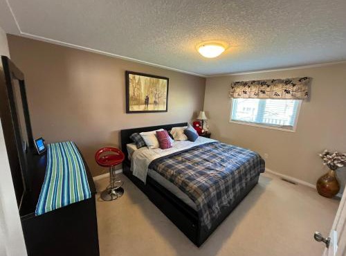 Spacious and Charming Bungalow Retreat (Close to Many Amenities)