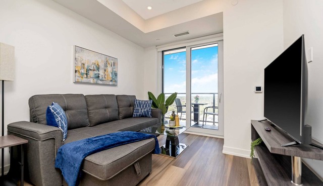 Stylish 1BR Condo w Balcony & Skyline Views