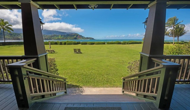 This beautiful beachfront Hanalei Bay home is located steps from the sand