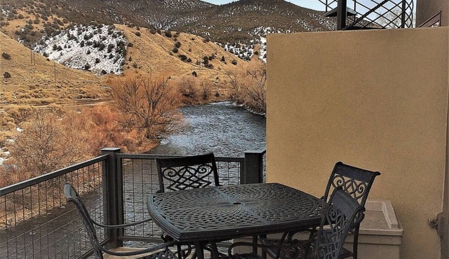 This riverfront downtown condo boasts and open floor plan for kitchen, living room, and dining areas. Or step onto the balcony over the Arkansas River to hear the water rushing by. Oversized master suite has its own balcony and indoor sitting area. in Salida