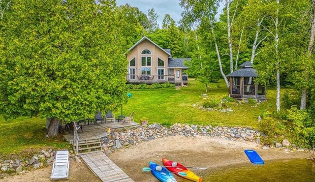 This well equipped lake house has a private beach and all-day sun.