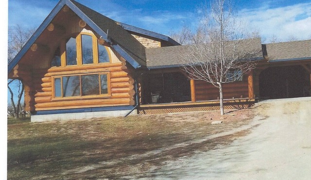 Three level Log Home on Private 40 Acre Estate.