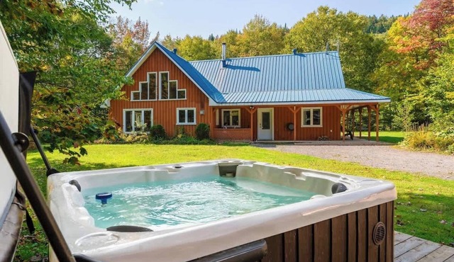 Waterfront Chalet with BBQ, Firepit & Hot Tub